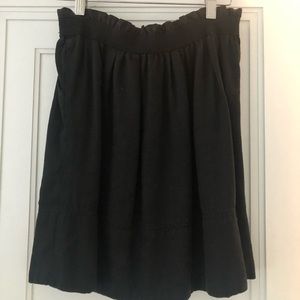 Adorable black mid length skirt.